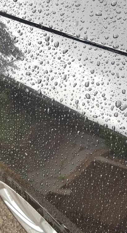 Close-up of water beading on a protected panel
